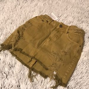 Distressed mustard yellow denim skirt